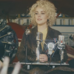 WATCH: Cam Channels Amelia Earhart in New ‘Mayday’ Video