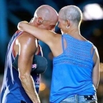 Kenny Chesney Shares An Emotional Moment With Fan On Stage
